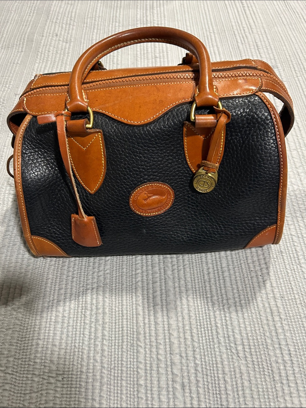 Dooney & Bourke Black with Tan Trim Pebbled Leather Toiletry Bag